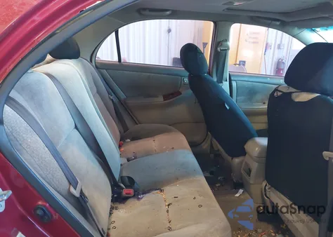 2003 Toyota Corolla Le z USA, uszkodzony, nr VIN 2T1BR32E13C066883